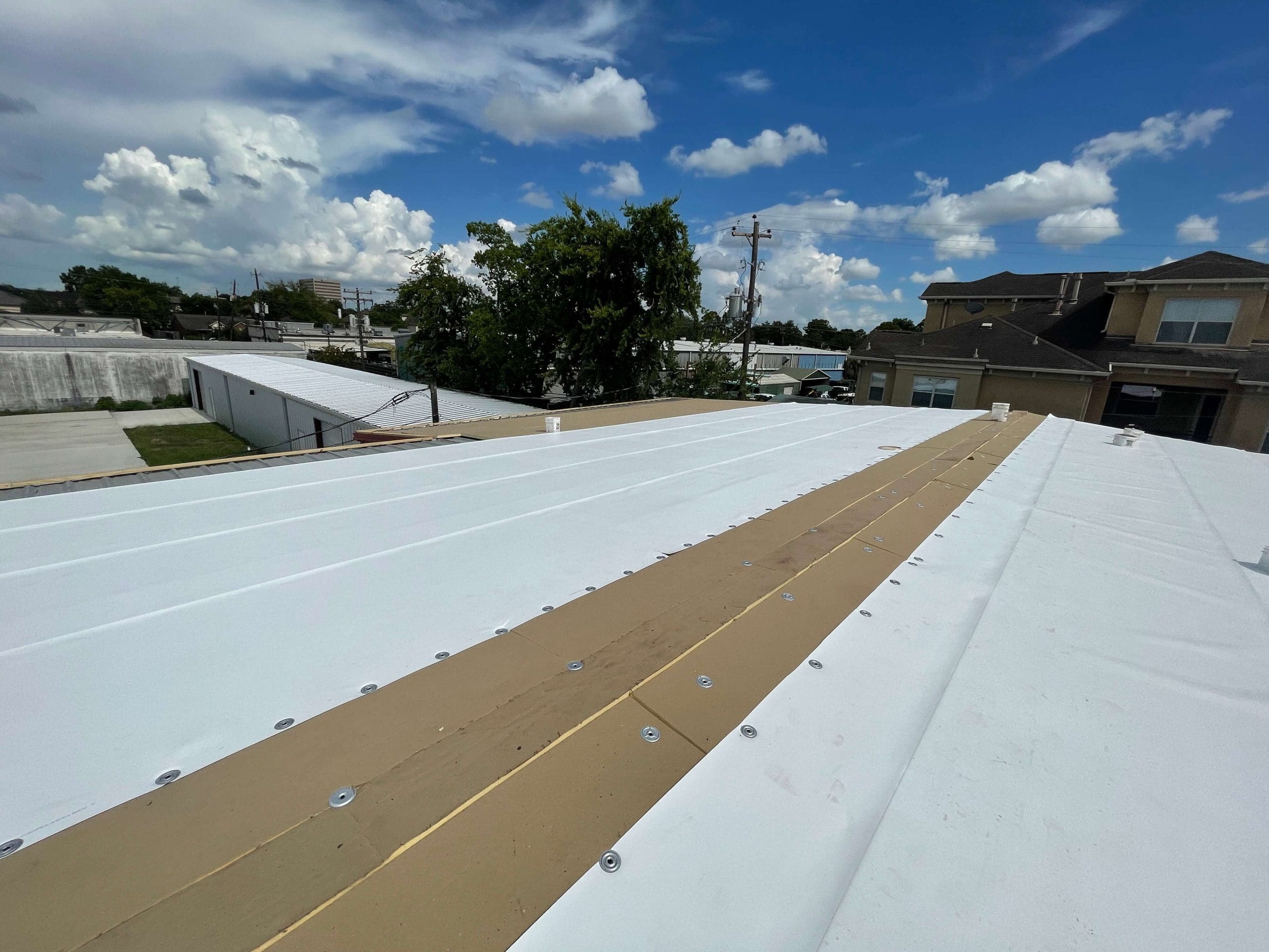 TPO Metal Retrofit Roof Installation Houston HHH Roofing Construction